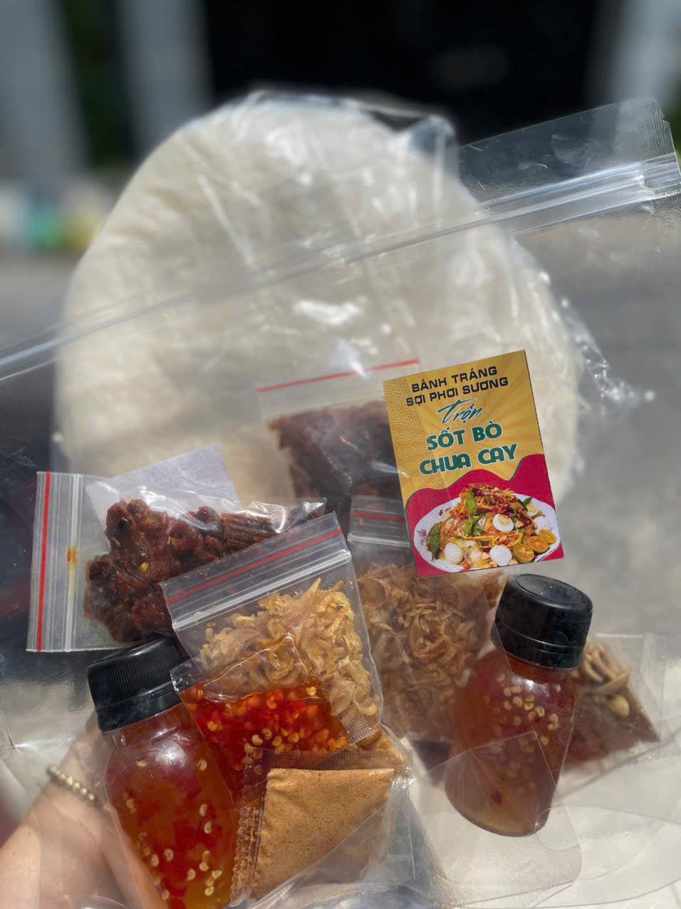 BÁNH TRÁNG PHƠI SƯƠNG SỐT BÒ CHUA CAY
